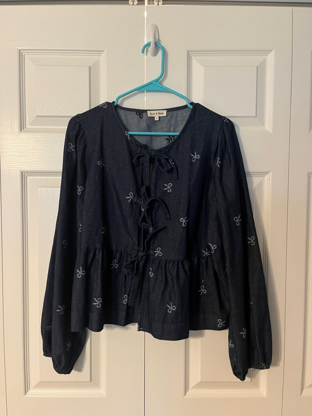 Erin and Amber Navy Bow-Embroidered Tie-Front Peplum Top size large